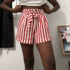 Red and white H&M paper bag shorts